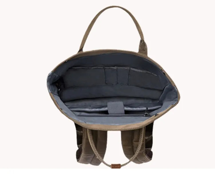 Casual black polyester backpack with cover opening, showing internal laptop pocket.
