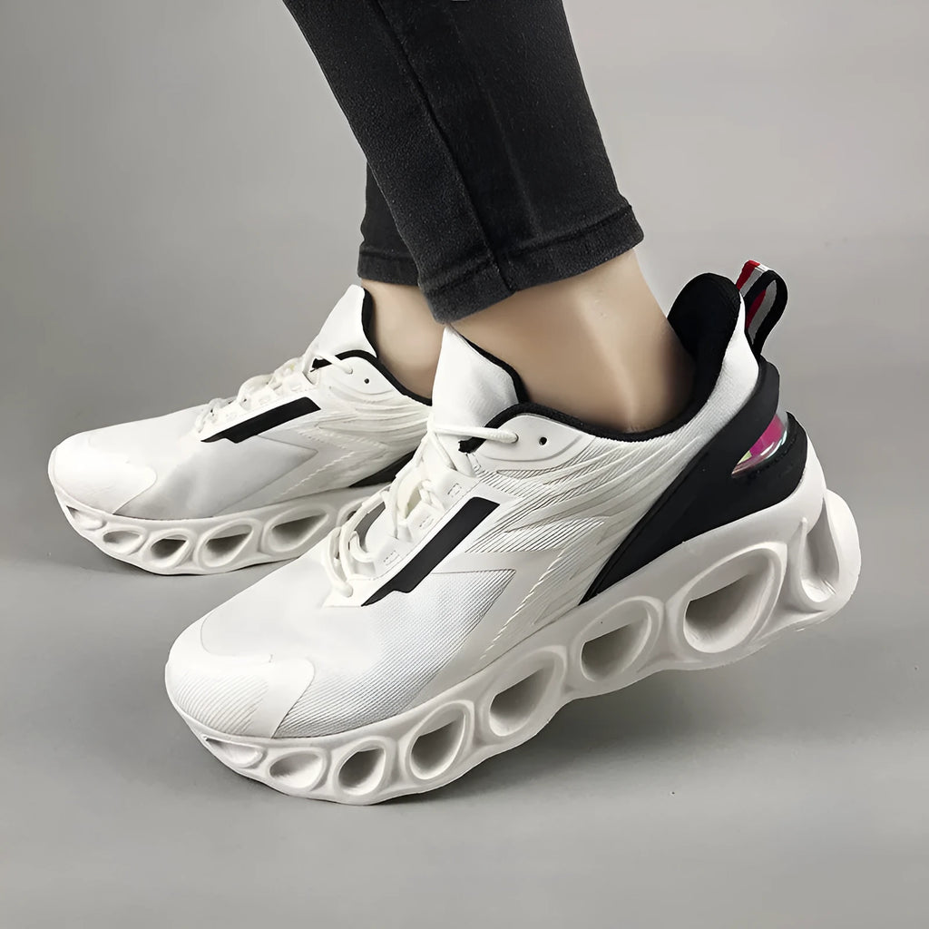 Men's low-top mesh sports shoes in black colour with white sole and lace-up front