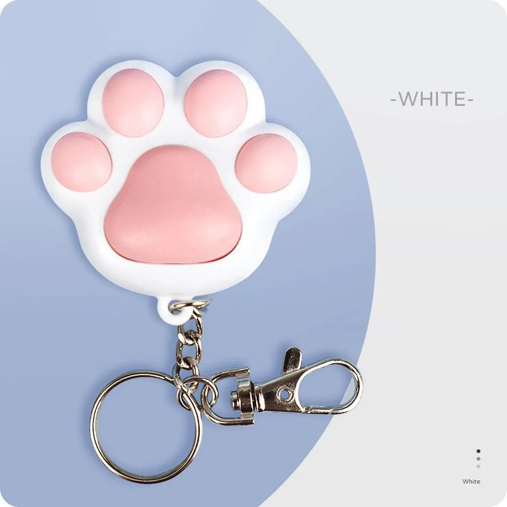 Pink and black USB-rechargeable infrared cat teaser toy with keychain loop.