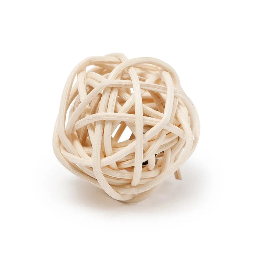 Set of two cat toys: a hollow rattan ball and a faux feather ball with bell, on a plain background.