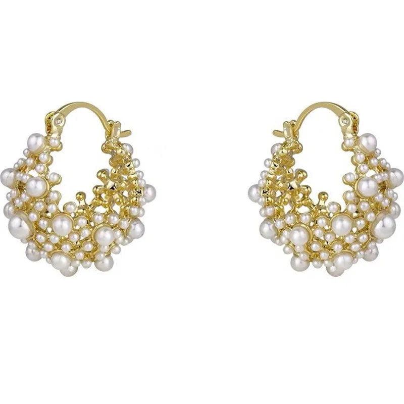 Gold colour women's floral basket design earrings with small beads and pearl inlay on copper