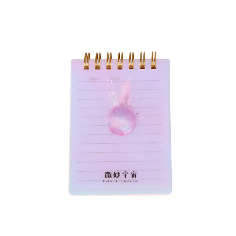 A7 spiral-bound rollover coil notebook showing PP cover in design series option with pages flipped over