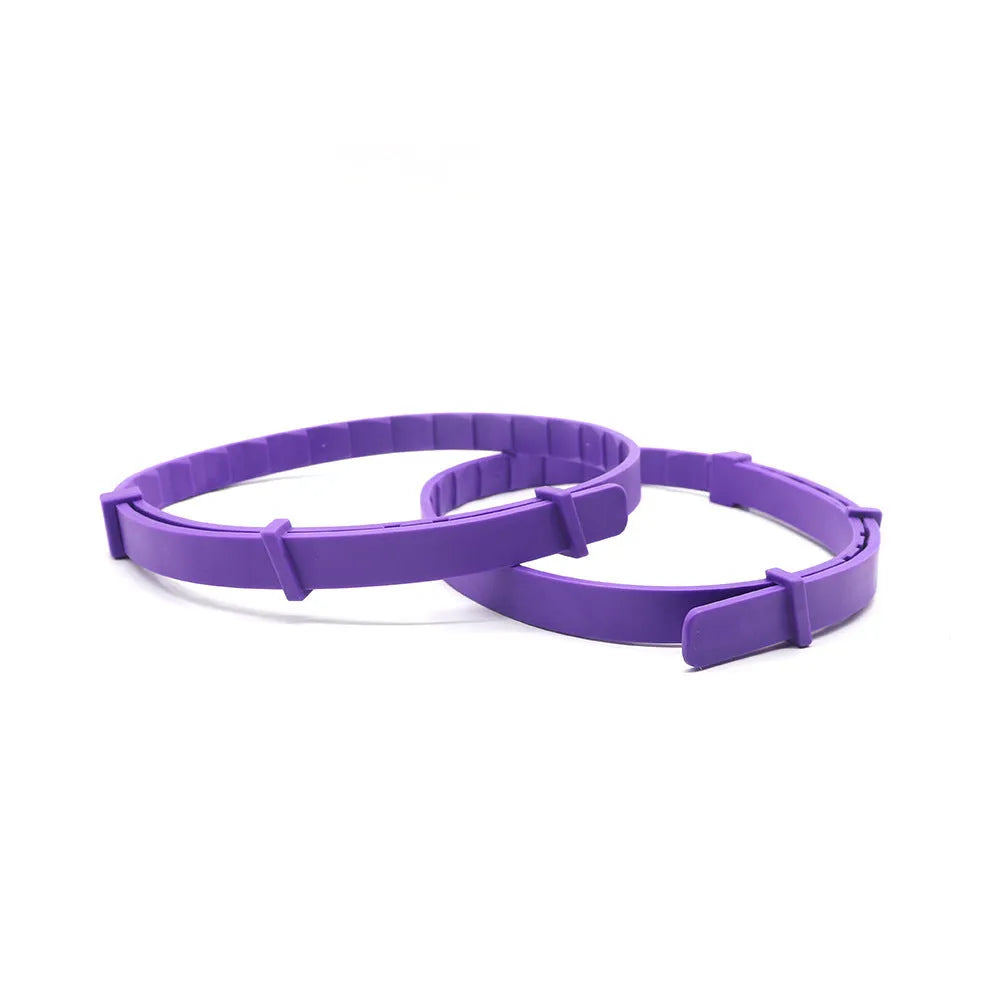 Four dog calming collars in assorted colours with adjustable 62cm length and TPR material