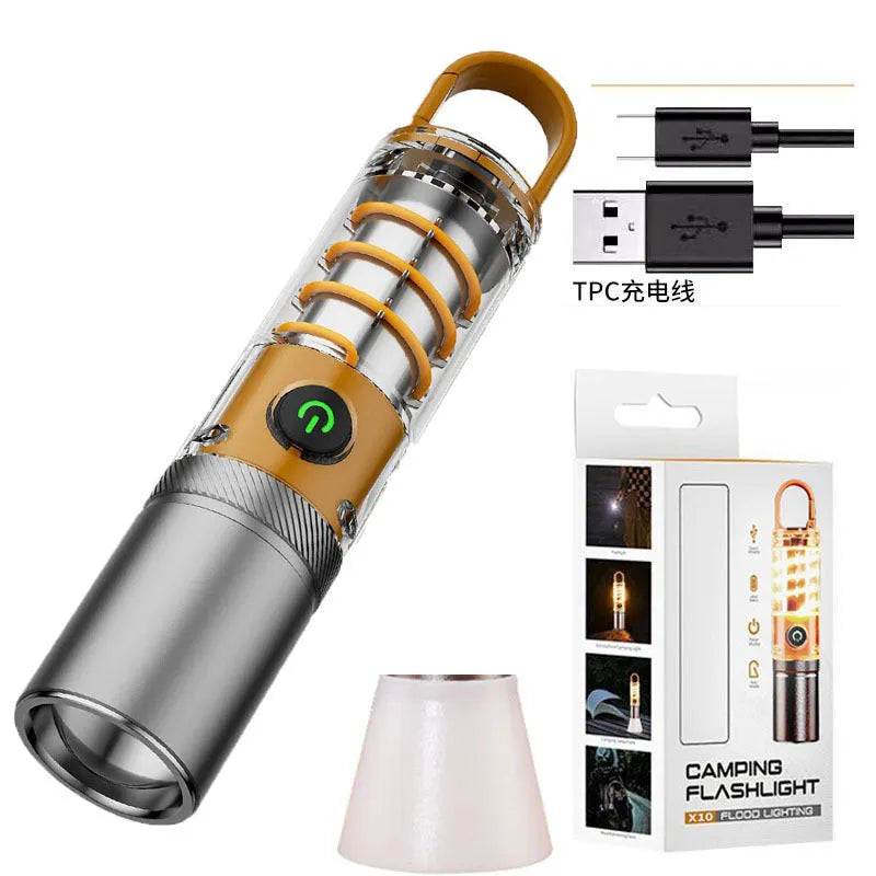 Orange 10W LED flashlight with optical zoom lens and keychain hook shown with USB charging cable