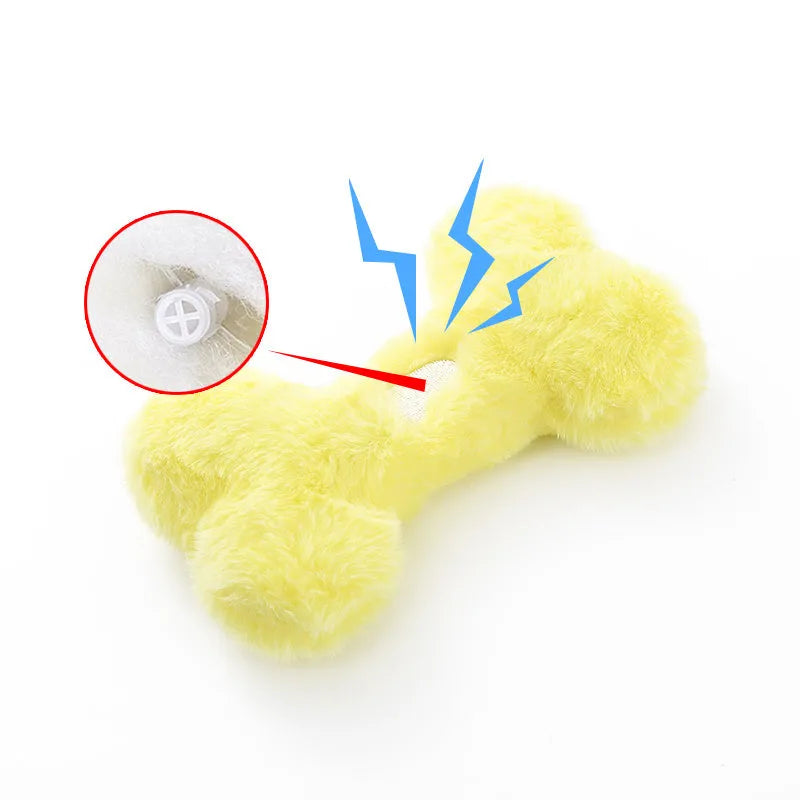 Blue plush bone-shaped dog toy with a squeaker for chew-resistant interactive play.