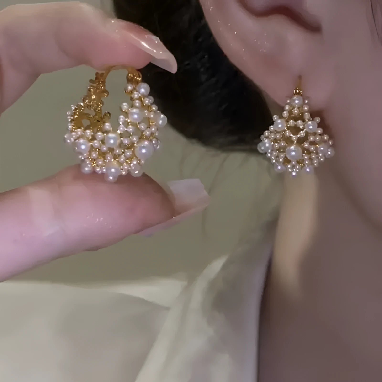 Gold colour women's floral basket design earrings with small beads and pearl inlay on copper