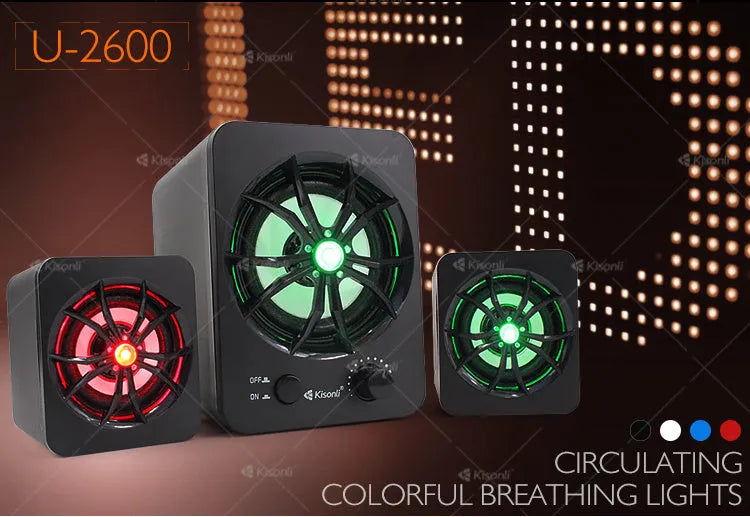 Green USB computer speaker with colourful glowing lights showing USB and audio jack ports