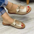 Women's black sandals with a fish mouth toe and decorative bow on the upper