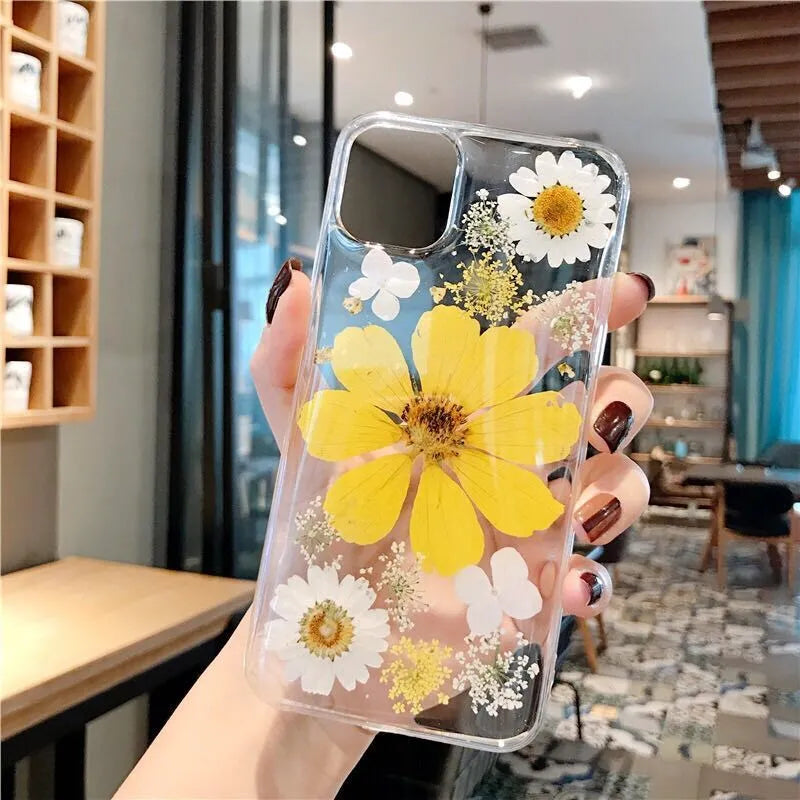 Slim TPU iPhone case with a large pink floral print on the back.