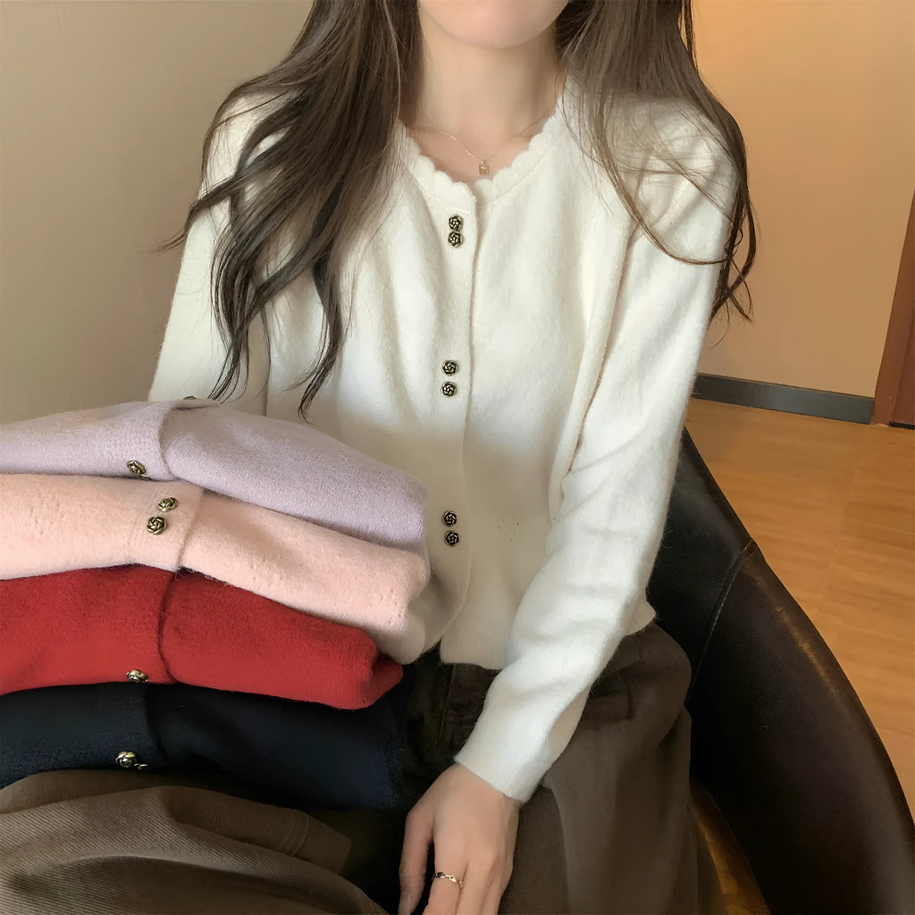 Women's long-sleeved acrylic cardigan coat in milky white, shown open in cardigan style