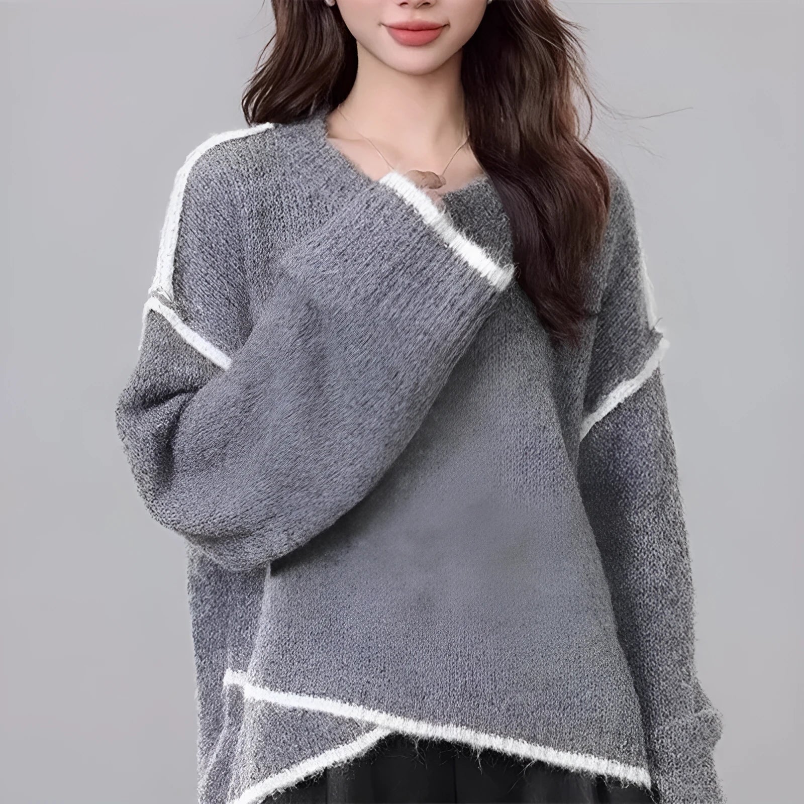 Women's idle style gray cotton loose pullover sweater on a plain background