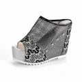 Korean women's platform flip flops with hollowed heel and chunky sole in black, gold, and silver colours.