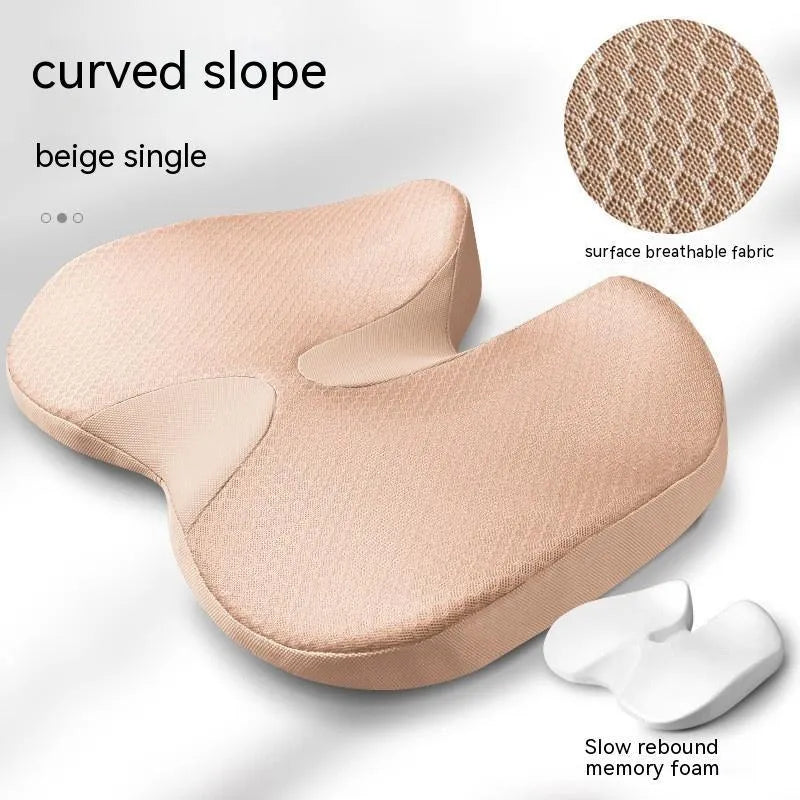 Curved memory foam seat cushion in beige with bevel design for tailbone support