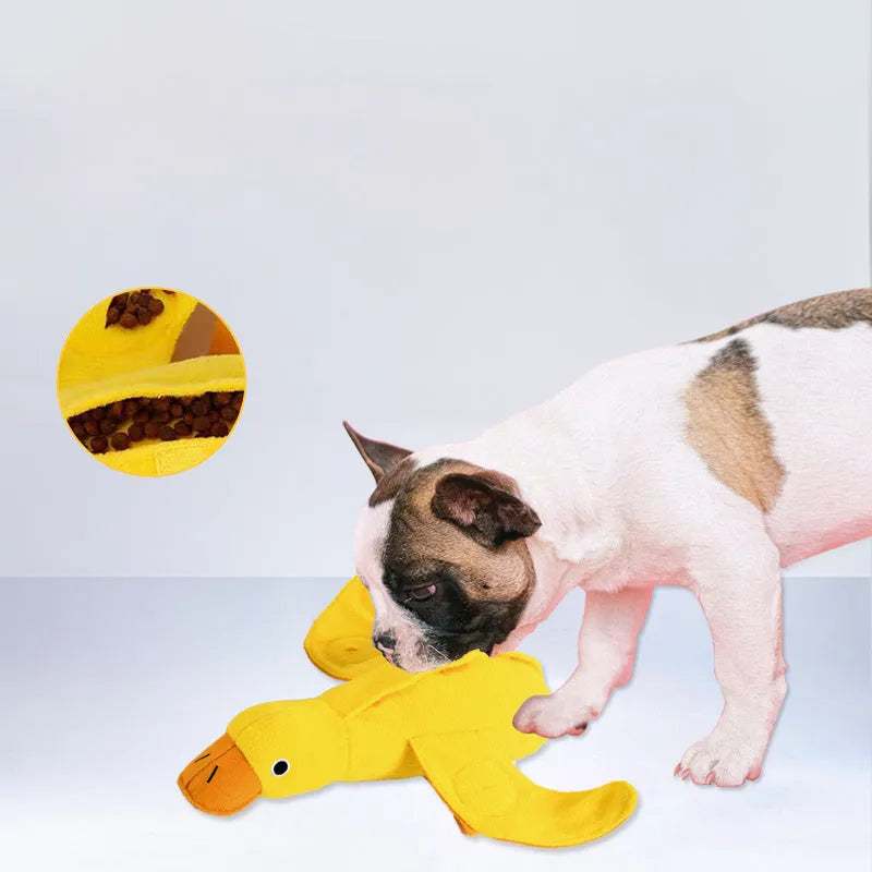 Yellow teddy-shaped rubber dog toy with squeaker duck sound and food leak holes