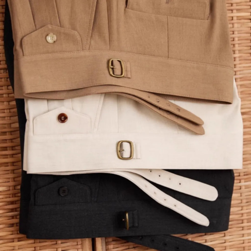 Slim-fit straight leg men's business trousers in dark grey, light brown, and light apricot colours.