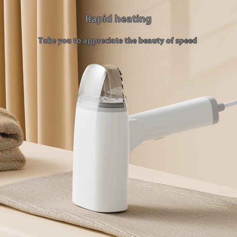 Blue and white handheld garment steamer with water tank and temperature control