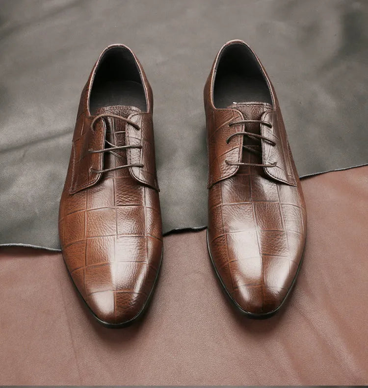 Men's black leather derby shoes with a pointed toe cap and anti-skid rubber sole.