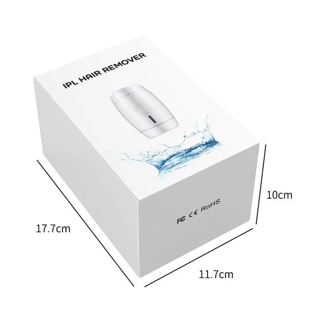 White home laser hair removal handset unit with display, shown next to its power adapter.