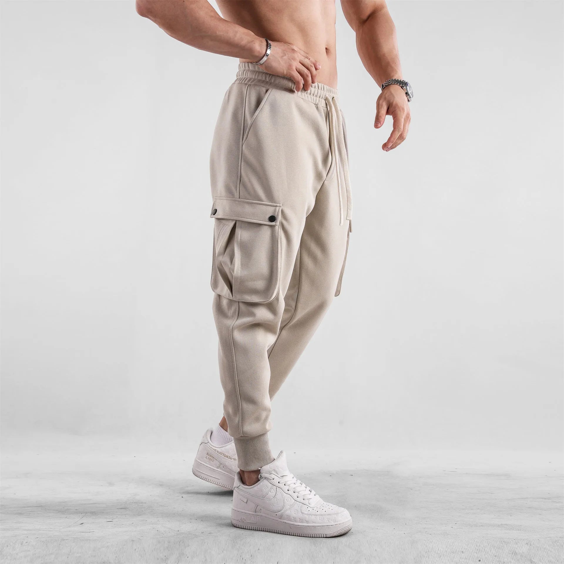 Men's loose fit cotton sports trousers with ankle tie detail and multiple pockets in various colour options