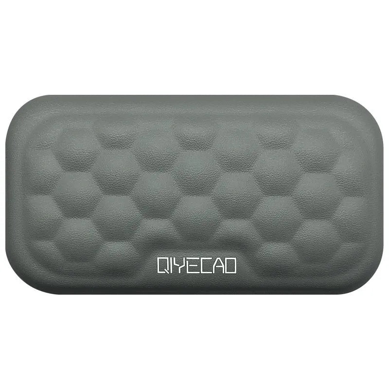 Gray cloth cover mouse wrist pad with memory foam and silicone base on a desk