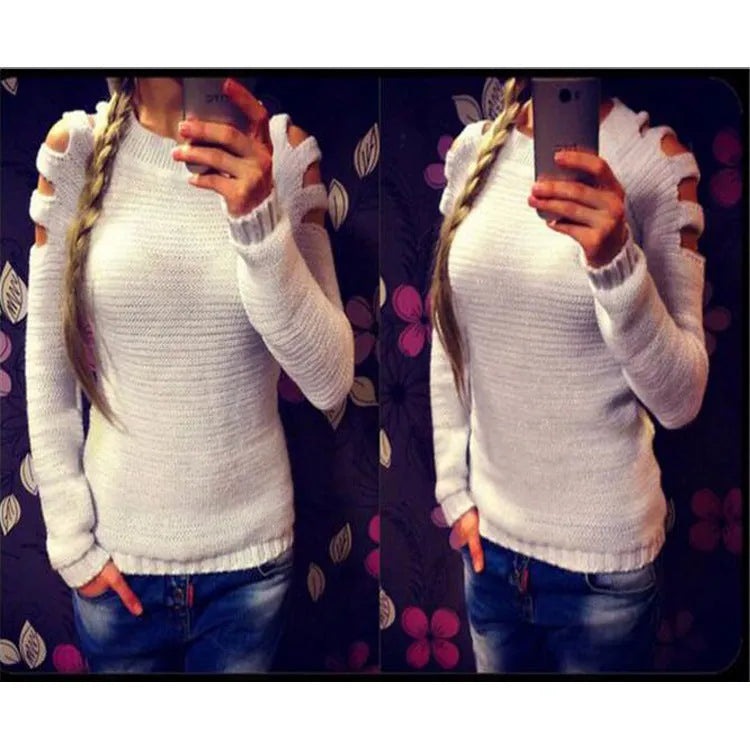 Women's white hollow-out crocheted knit shirt with round neck and long sleeves laid flat.