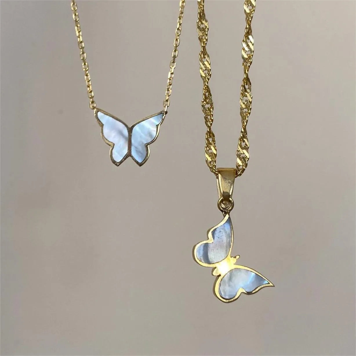 Electroplated 18K gold butterfly clavicle chain necklace for women with titanium steel chain and abalone shell pendant