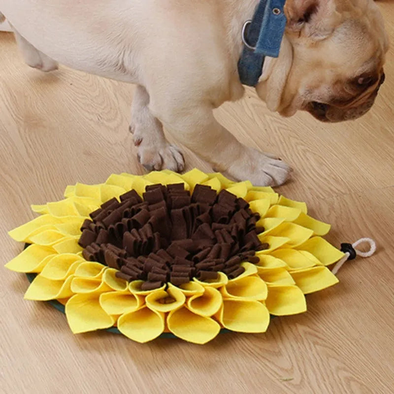 Yellow sunflower-shaped dog snuffle mat with fabric layers for hiding treats during nosework training