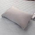 Blue and grey polyester cooling blanket with Japanese Q-Max fibres on a bed.