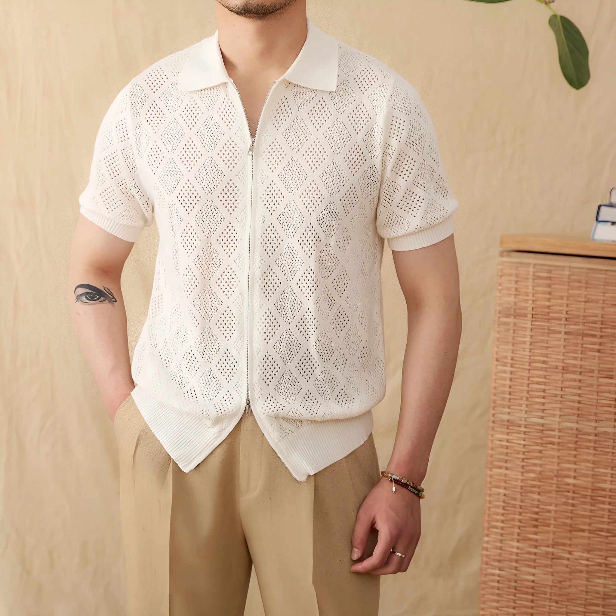 Light brown cotton short sleeve cardigan with lapel collar and full-length front zipper.