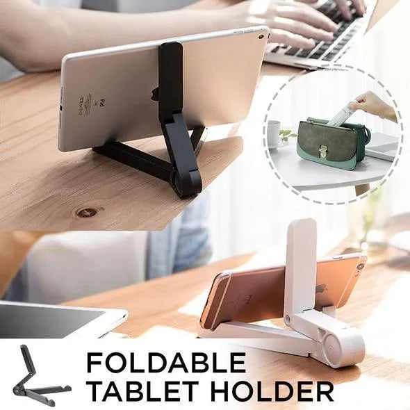 Black foldable tablet holder open in landscape mode holding a smartphone, showing its compact size and non-slip rubber surface.