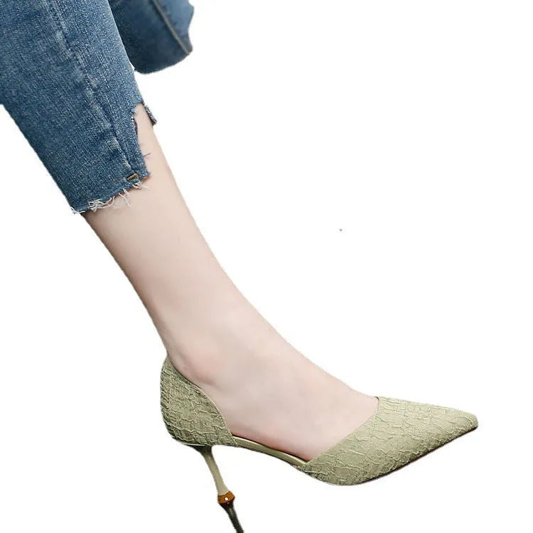Women's black pointed toe stiletto high heels with a 6-8cm heel on a rubber sole