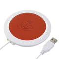 Black USB-powered heating coaster with high temperature heater for desk use.
