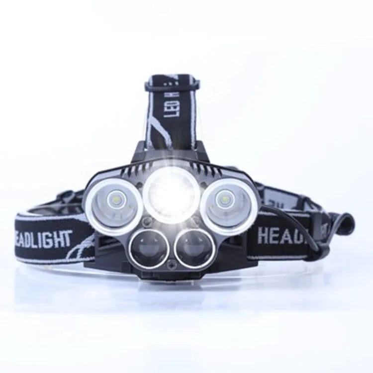 Fixed focus LED head torch with head strap, shown with its included charger.