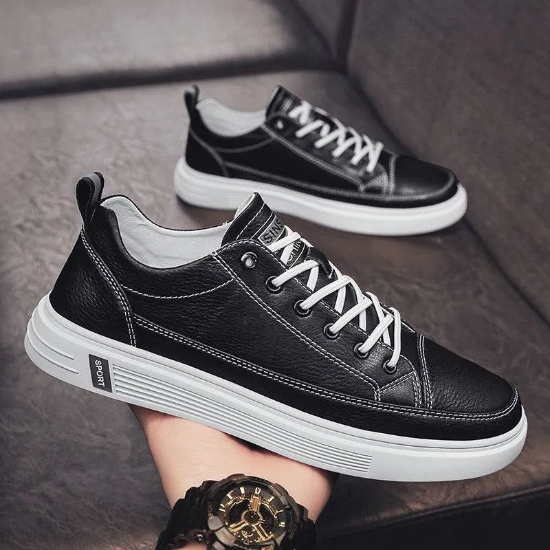 Men's white PU leather casual sneakers with a flat bottom and low heel on a plain background