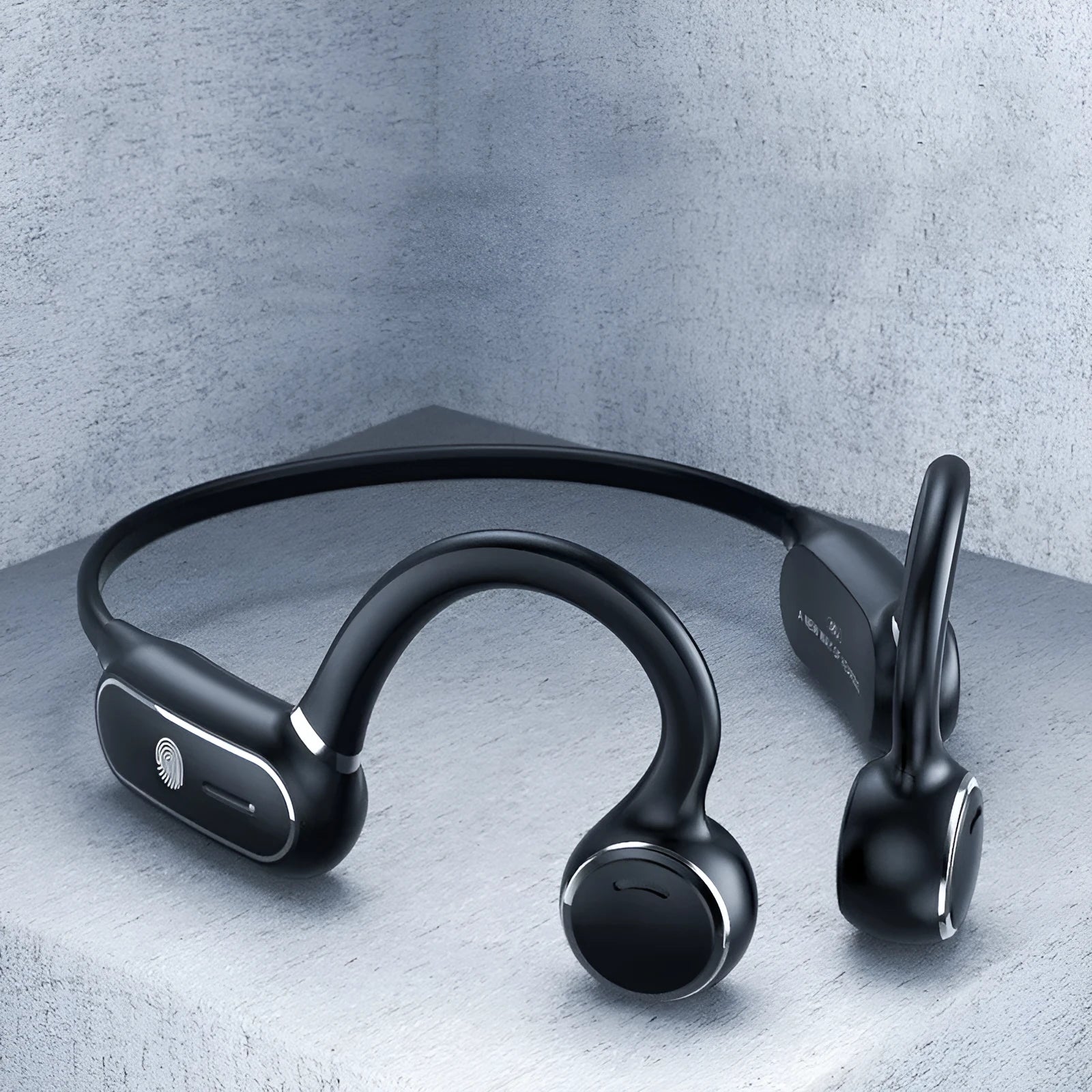 Black air conduction Bluetooth wireless earphone with an ear-hook design and touch controls on the housing.