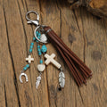 Cross alloy leather tassel pendant keychain in retro style, colour XY-3669, on a neutral background