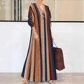 Women's camel coloured knitted A-line dress with vertical stripes and V-neck design