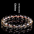 Natural citrine ball bracelet with scattered beads design in gold-brown colour