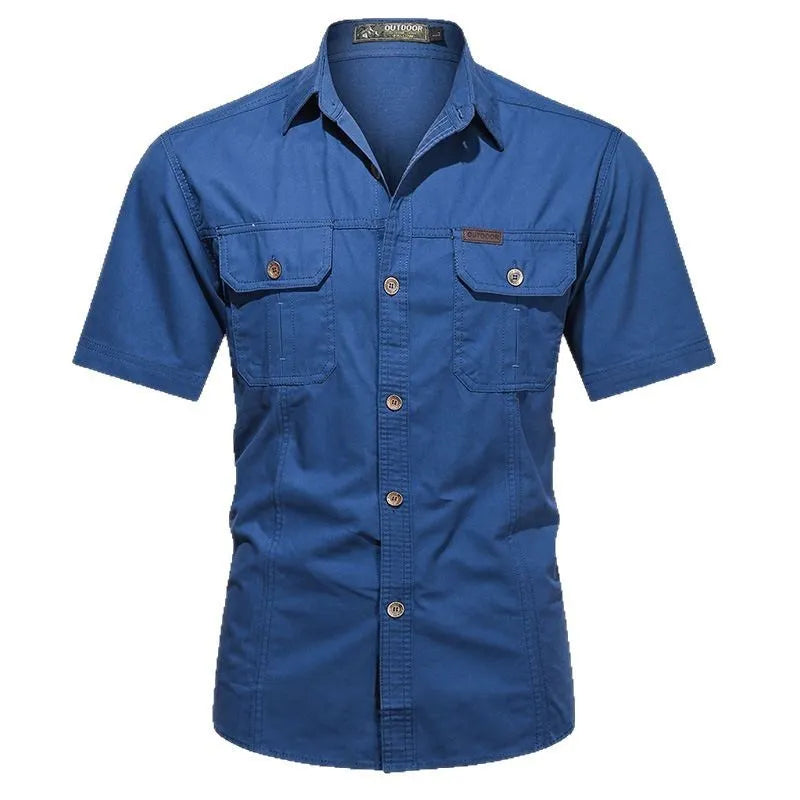 Men's army green cotton work shirt with short sleeves and non-iron finish on a hanger.