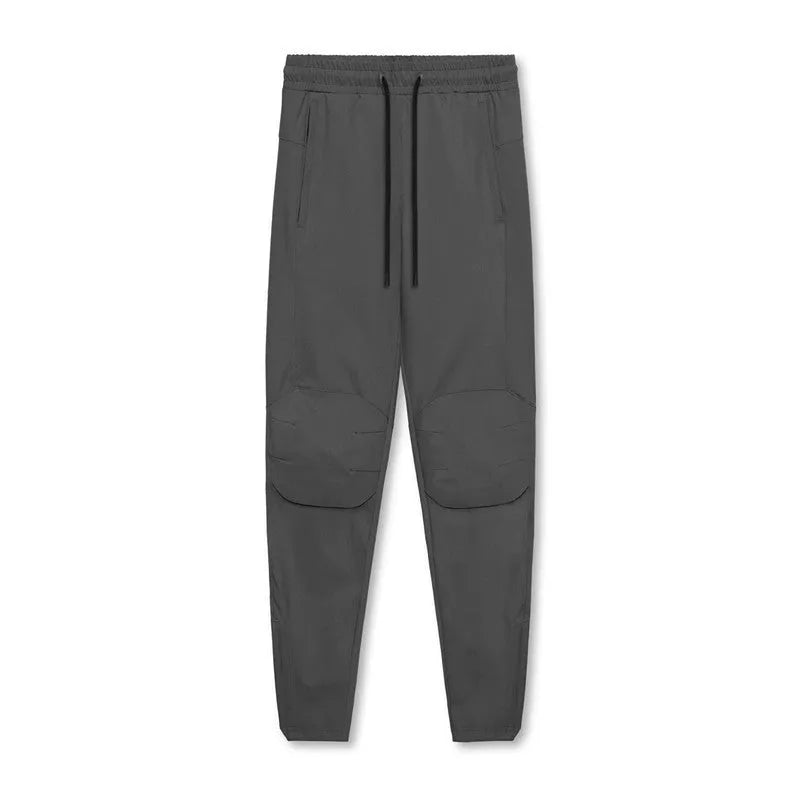Men's grey quick-dry fitness pants with ankle ties in loose casual style