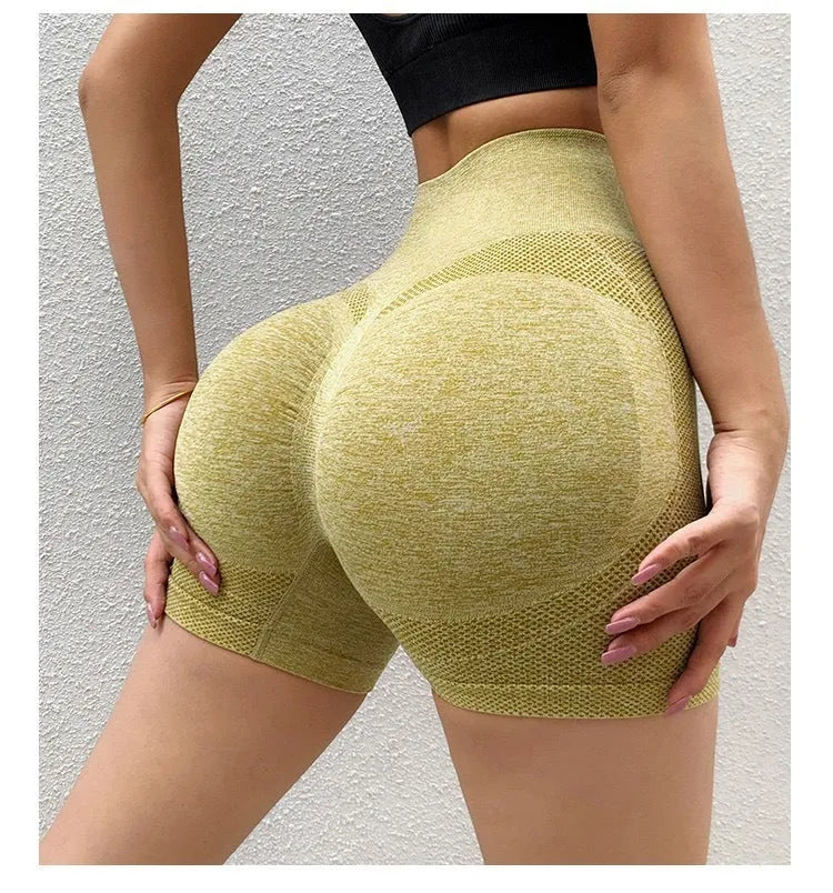 Women's high-waist seamless yoga shorts in black nylon blend fabric for fitness and running
