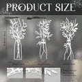 Set of three metal flower wall art pieces with colour vase accents on a white wall.