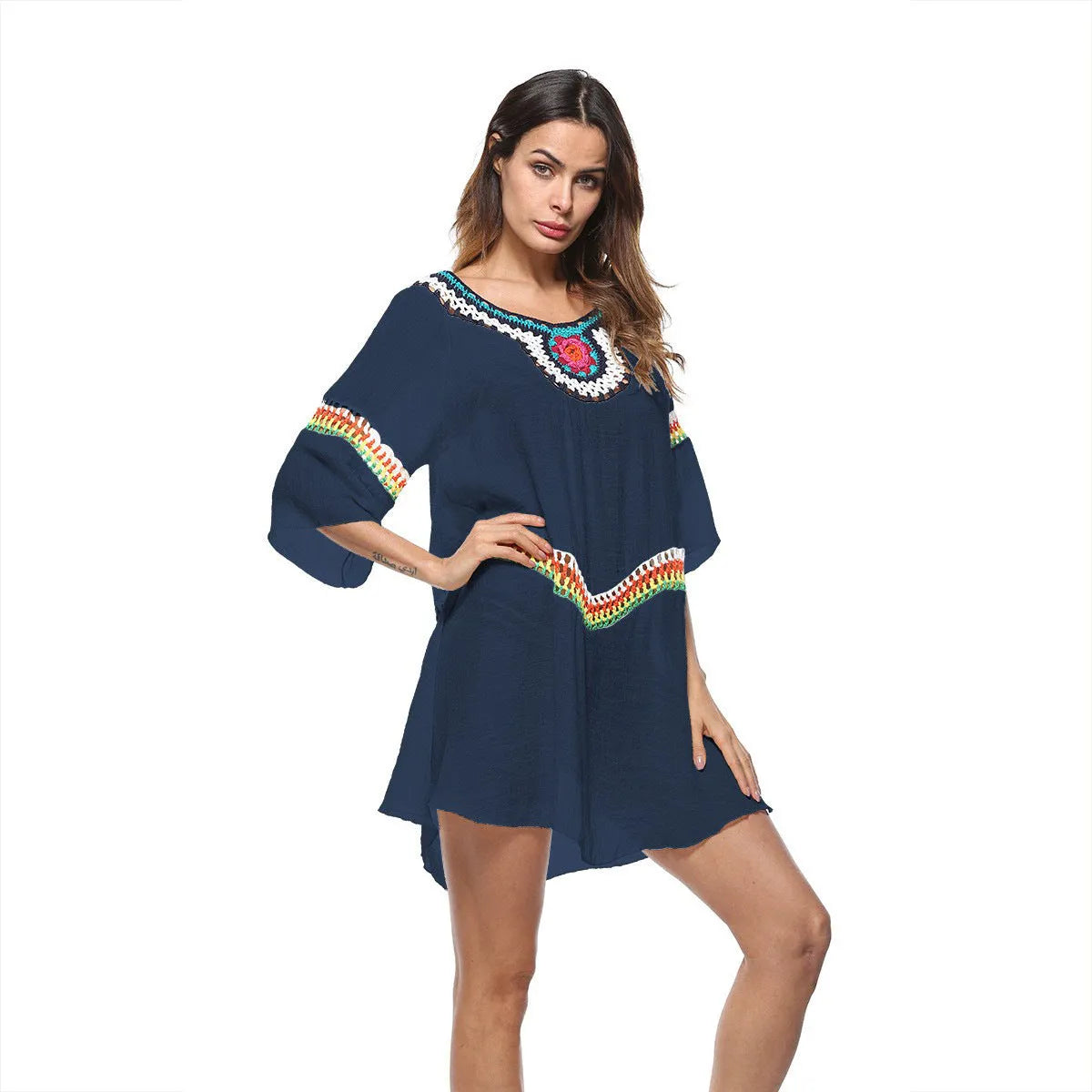 Women's crocheted polyester beach cover-up in apricot colour, shown as a sun protection top for swimming.