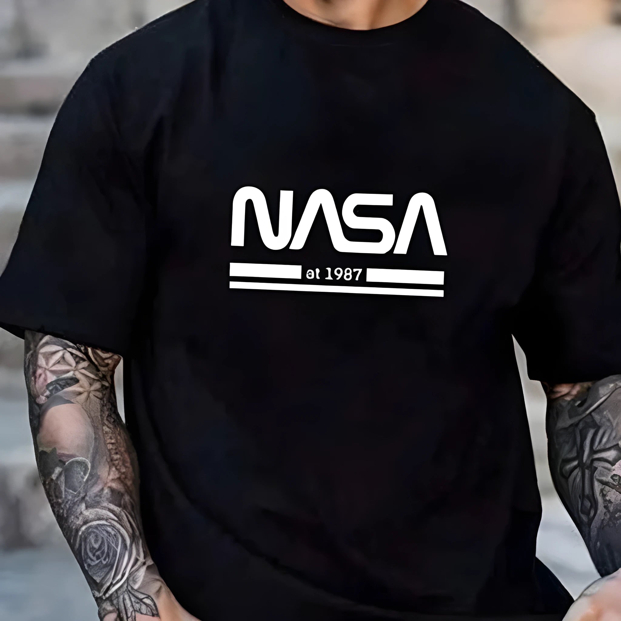 Men's slim-fit cotton t-shirt with printed letters, shown in apricot colour.