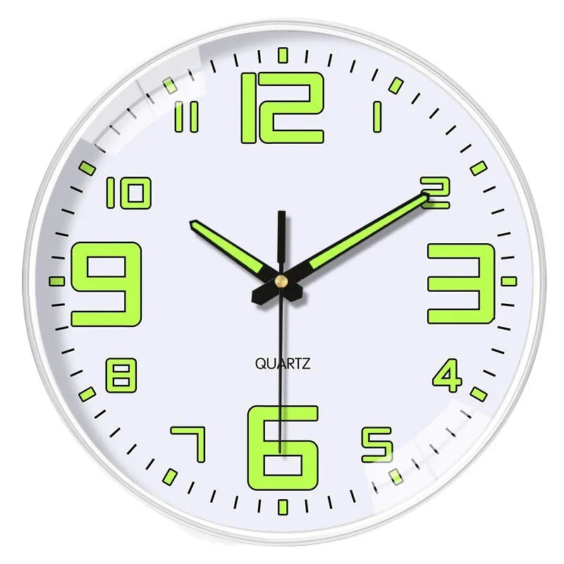 8 inch modern wall clock with luminous hands and black numerals on a light dial.
