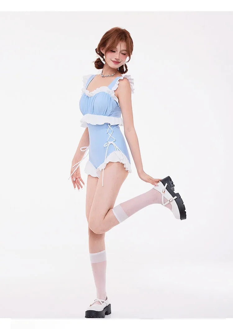 Light blue women's one-piece swimsuit with lace gathered chest and high waist.