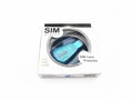 Blue external USB SIM card reader for mobile phone data backup and management.