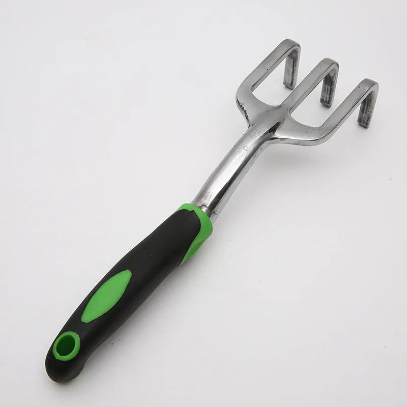 13-piece garden tool set with alloy steel tools and aluminium handles in a storage bag on a wooden table