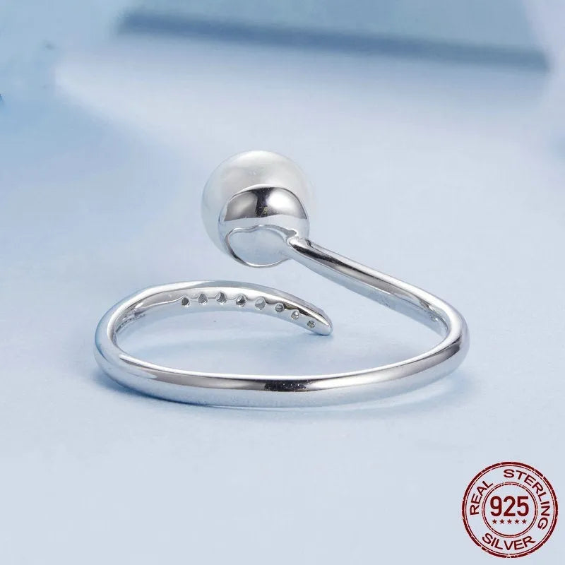 Adjustable S925 sterling silver ring with shell pearls design and open loop for flexible fit