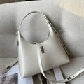 Soft genuine leather crossbody shoulder bag in a dumpling shape, shown in one of six available colours.